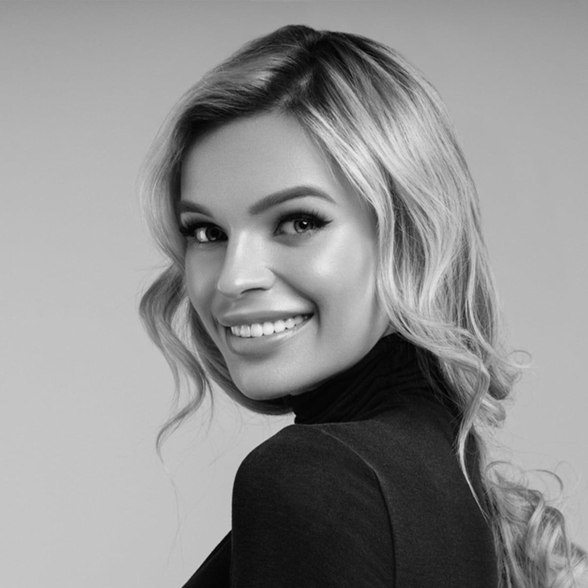 A Woman Posing For The Camera