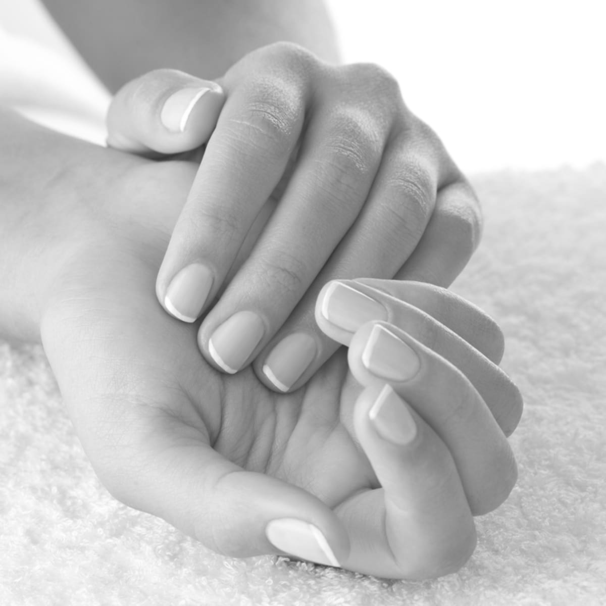 Close Up Of Hands With Manicured Nails